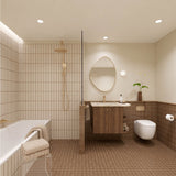 Long terracotta tiled bathroom with bath, walk-in shower and timber vanity with cream stone benchtop